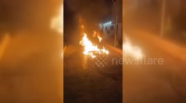 Israeli Settlers Torch Palestinian Vehicle, Spray Racist Graffiti in Qalqilya District