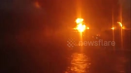 Four missing after cargo ship catches fire off coast of India