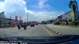 Police motorbike rider injured when barrier falls from the back of truck