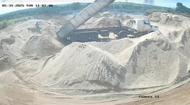 Driver miraculously survives after lorry unloading sand is crushed by massive faulty piston