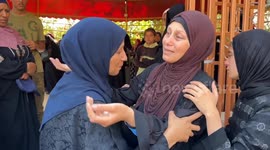 Palestinians mourn after 10 killed in Israeli attack in Gaza