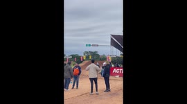 Motorcycle collides with man after landing ramp jump in Santa Cruz de la Sierra, Bolivia