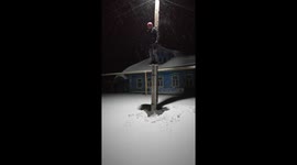 Man jumps off pole and leaves human imprint in snow in Ivanovo, Russia