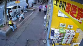 Man accidentally crashes into store's glass wall in Beijing, China