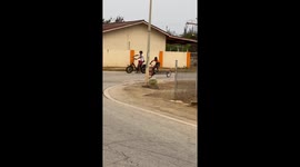 Boy drifts on custom long-frame bicycle in Kralendijk, Bonaire