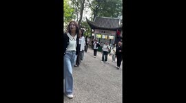 Man sports unique twin-feather hairstyle in Jiangsu, China