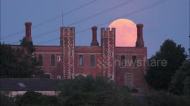 Stunning full Strawberry Moon rises above historic Kent gatehouse, UK