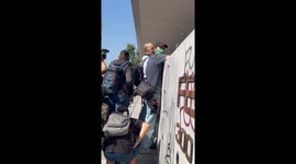 Protesters demonstrate against ICE raids in downtown Los Angeles