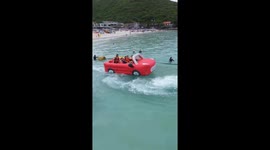 Inflatable beach ride is shaped like a convertible car