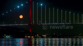 Türkiye: Spectacular full moon over Bosphorus Bridge in Istanbul