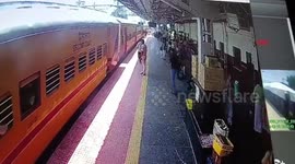 Male passenger slips while boarding moving train falls into platform gap, rescued
