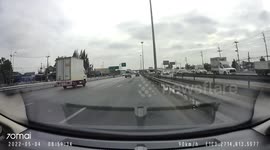 Motorcycle Crashes into Car on Freeway