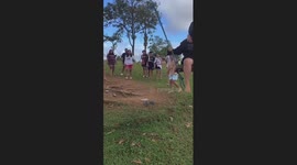 Three girls fall when they topple backwards off rope swing