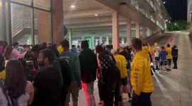 Indiana Pacers fans cheer for players and coach outside arena in Indiana, USA