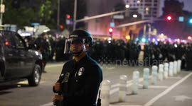 Protestors and journalists are detained in front of the Roybal Federal Building during Anti-Ice Protest