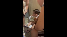 Boy Takes Food Out of His Mouth and Gives It to the Puppy