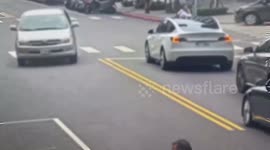 Classic car crashes while turning onto road in Taiwan