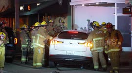 US, Los Angeles: Sherman Oaks Car Into Building