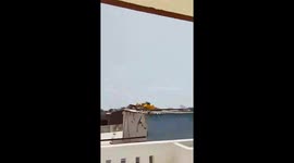 Air India plane explodes in fireball as it crashes into homes