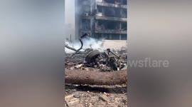 Air India plane crash wreckage doused by firefighters