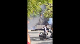 Air India plane crash wreckage burns in front of shocked locals