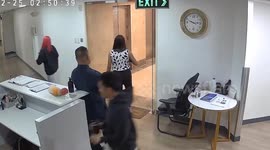 Hapless worker walks straight into glass door