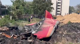 Tail of crashed Air India plane seen among wreckage