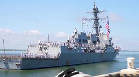 Relatives welcome home sailors as US warship returns to Virginia