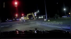 Suspect in stolen excavator leads police on a one-hour slow-speed chase