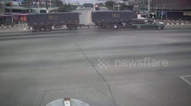 Truck runs red light and crashes into school van leaving seven people injured