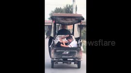 Young Brothers Caught in Hilarious Hair-Pulling Fight on Moving Tricycle in Henan, China