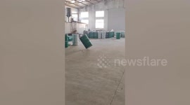 Man spins a 200-litre oil drums into perfect position using only his hands