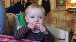 Baby Eats Lemon