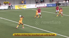 SUFCtv: Sutton United fan knocked out cold by ball