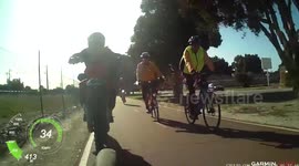 Dirt bike rider drives on cycle lane
