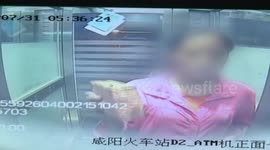 This woman really doesn't like cash machines