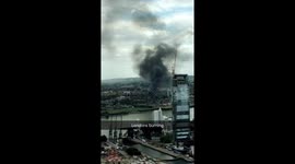 Smoke rises over Greenwich during nightclub fire