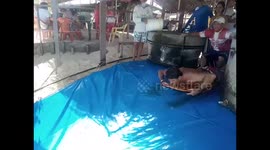 Dude travels a further 200m after barrelling down epic water slide in Brazil