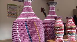 Retired couple use 200 packs of cards to make vases
