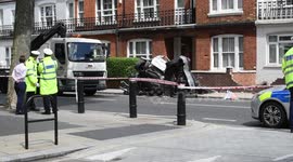 Woman dies in police pursuit after drone flown near a London prison.