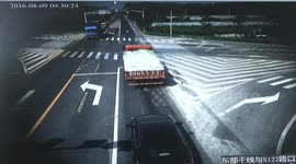 Lorry turns over after turning a corner dropping pigs out