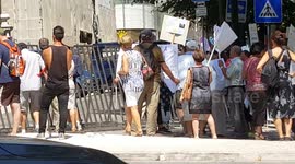 People protest outside Novo Banco in Lisbon