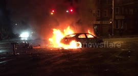 Cars burning Baltimore