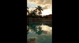 pool, rain, and gold clouds.