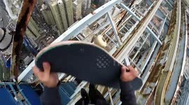 Daredevil skateboarder balances on edge of skyscraper in Hong Kong