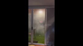 Man walks into closed glass door during karaoke party in Manado, Indonesia
