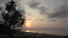 The beauty of the sunset in the Mentawai Islands. The color is golden yellow at the end of the sea