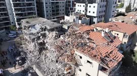 Israel: Drone footage shows heavily damaged buildings in Tel Aviv after Iran’s attacks