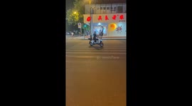 Husky excitedly hops on two legs while crossing the road in Henan, China