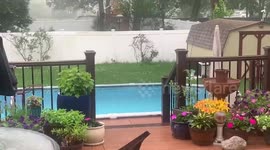 Intense rainfall soaks neighborhood in East Islip, New York, USA
